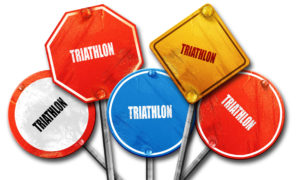 a boquet of signs that read 'triathlon'