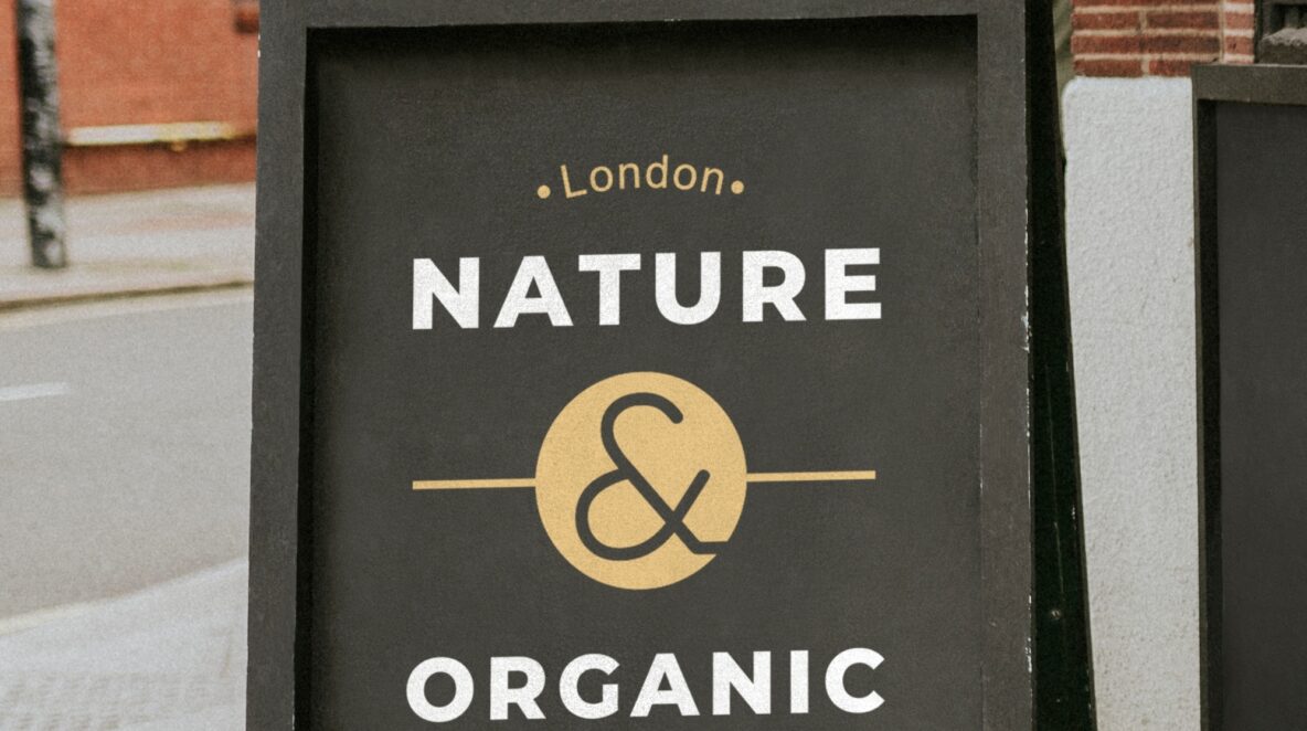 A sandwich board that says "Nature and organic".